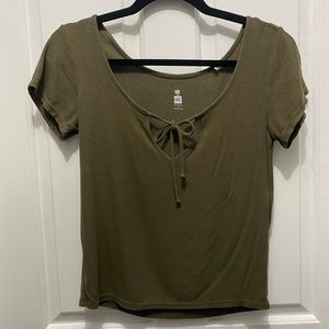 Green fitted boutique shirt with cute tie in front! Very comfy!